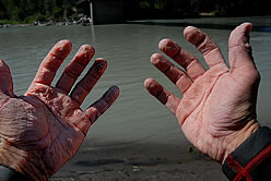 Jason's hands at the completion of the kayak portion. Photo © Jason Hummel