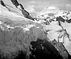 Shuksan's Hanging Glacier on the first ascent of the Northwest Couloir in July 1957. The original was color, but faded and restored in black and white. © Ed Cooper