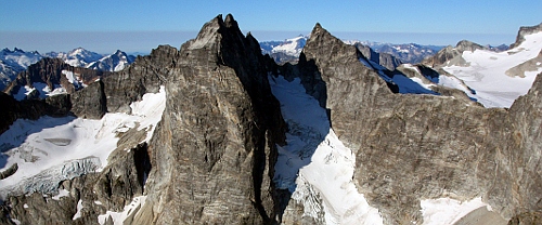 Aerial view of Mox Peaks (Twin Spires) from the NE. Photo &copy; John Scurlock.