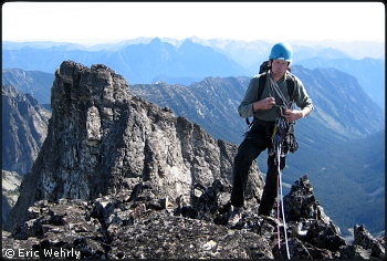 Rolf Larson atop SE Mox Peak with Lemolo Peak (&ldquo;Hardest Mox&rdquo;) in the background. Photo &copy; Eric Wehrly.