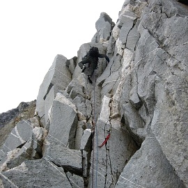 Rolf Larson climbing the first pitch of Tillie&rsquo;s Tower, North Ar�te. Photo &copy; Eric Wehrly.