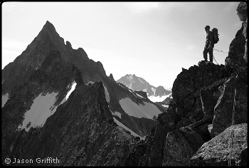 Tim Halder pauses on the Torment-Forbidden Traverse. Photo © Jason Griffith.