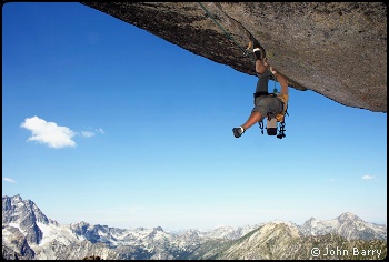 Tom Ramier frees the “Full Tilt” pitch on the Tempest Wall. Photo © John Barry.